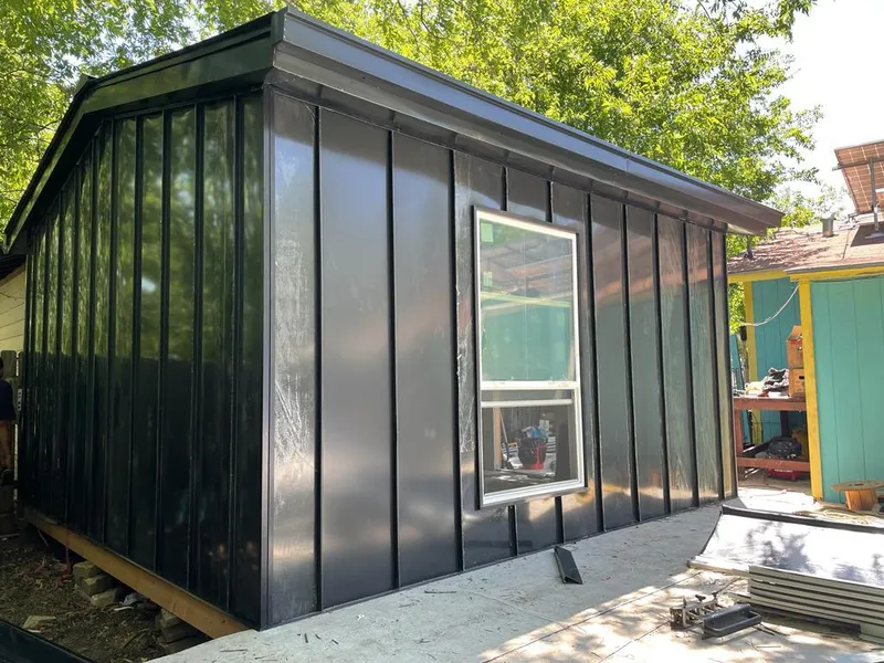 Black standing seam metal wall panels for Metal Roof Installation in Aiea